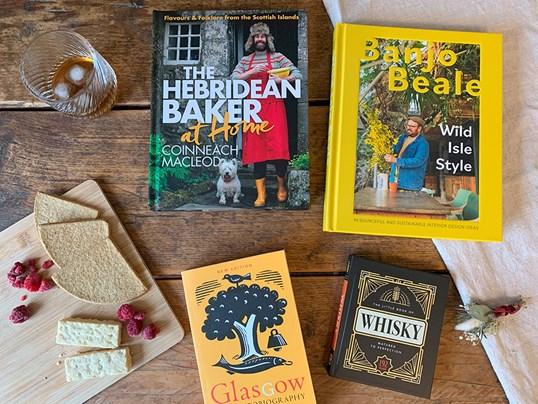 Scottish themed book scattered on a table